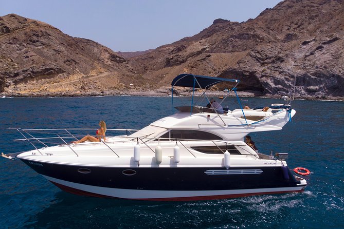 Dolphin Searching Tour in Puerto de Mogán ("KEEPER UNO" Boat) - Cruising the southwest coast: scenic stops that are not just filler