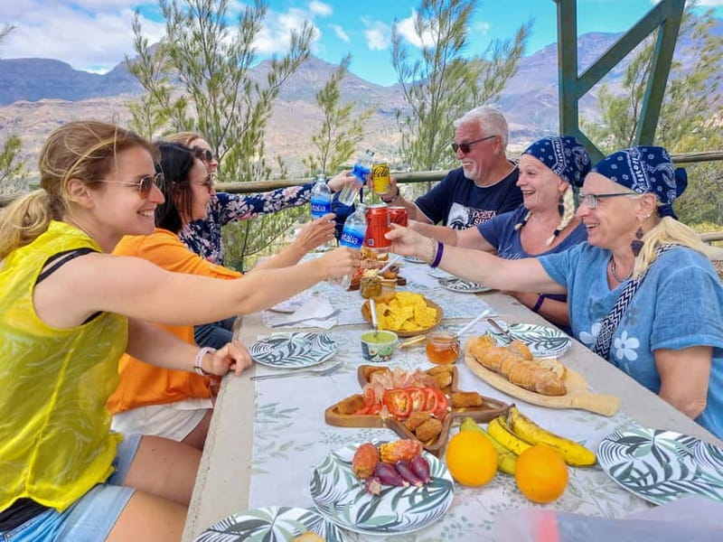Gran Canaria: Red Gorge, Cave, Oasis Adventure Tour & Picnic - Temisas photo stop and town time: olive trees, quiet rhythm, real Gran Canaria